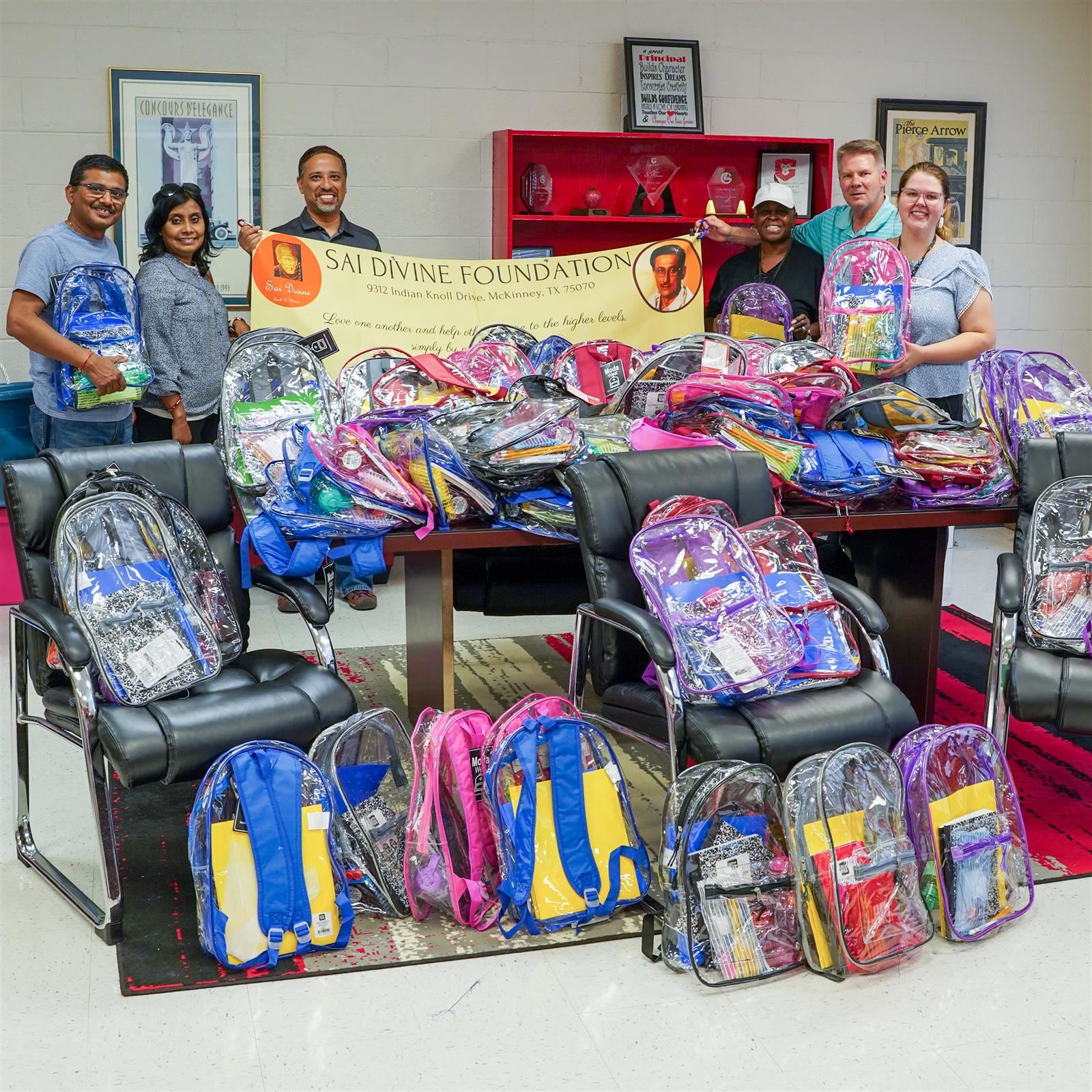  Sai Divine Foundation donates clear backpacks and school supplies for GISD students